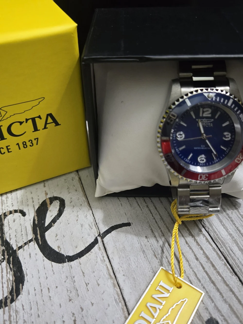 Invicta Blue Dial Watch with Red & Blue Bezel